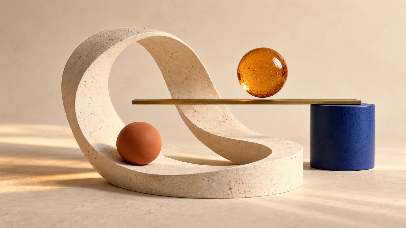 Amber and terracotta spheres balance along a curved ivory track and a straight brass rail
