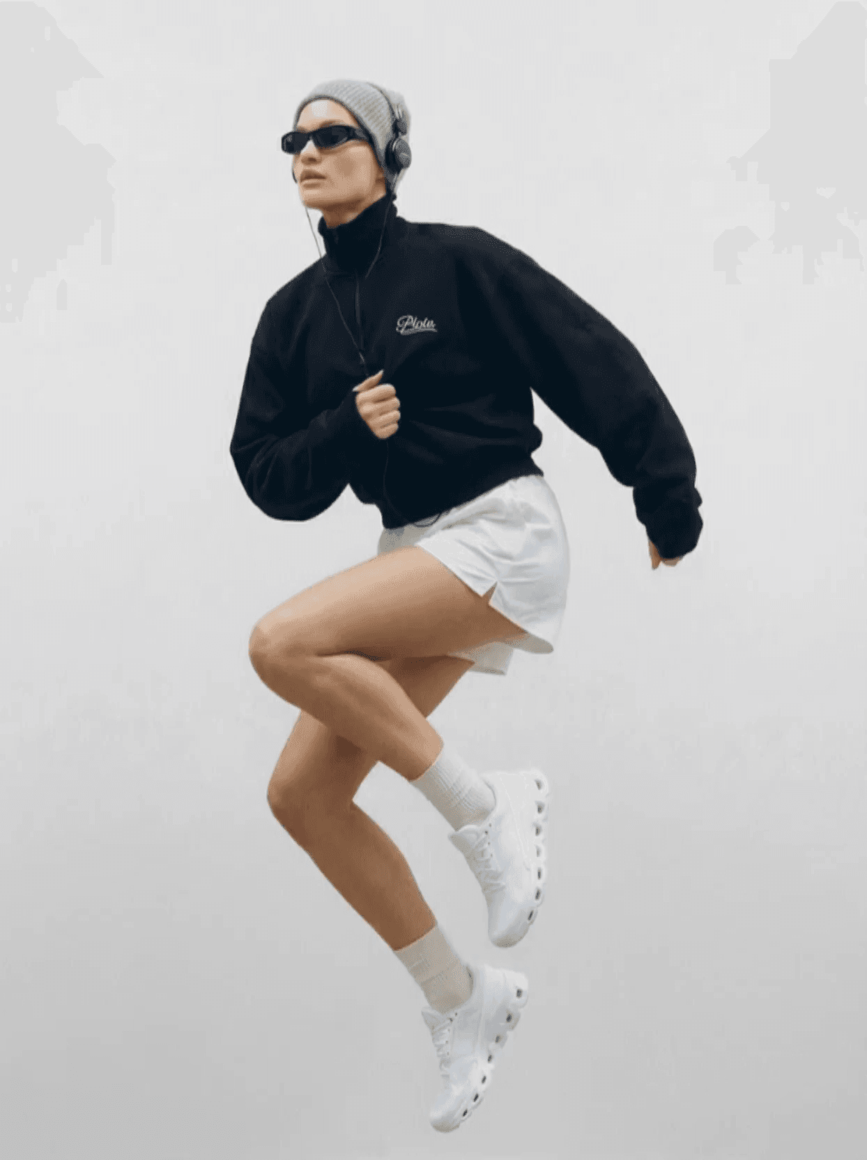 Fictional trail-running campaign hero showing an athlete in motion