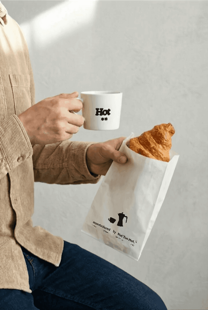 Fictional neighborhood cafe feed post with coffee and pastry